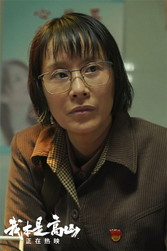 2.海清饰张校长.jpg